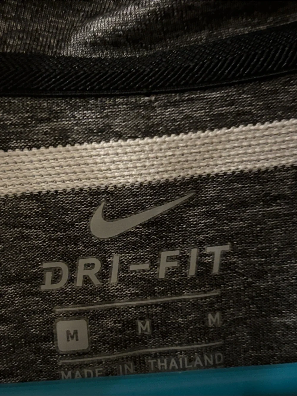 Nike Sleeveless Dri-FIT Polo Tank in Charcoal and White